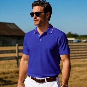 Detail of royal blue polo shirt collar featuring classic red, white, and blue stripe accents