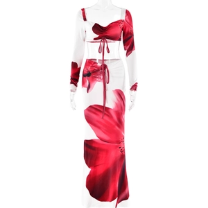 Women's 2-piece set with red floral crop top and long drawstring skirt on white