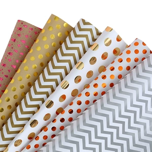 Large double-sided gift wrapping paper with metallic gold foil stripes and dot patterns