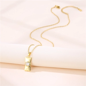 Gold stainless steel necklace with rectangular pendant and clear round cubic zirconia