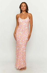 Detail shot of pink floral summer dress showing the soft fabric and thin strap design