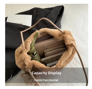 Brown faux fur tote bag interior showing large capacity for umbrella and notebook