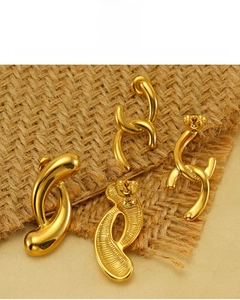 Detail of 18k gold plated geometric earrings showing lead-free and nickel-free quality