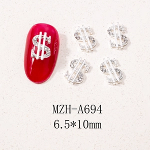 Detailed view of silver dollar sign nail charms with rhinestones measuring 6.5x10mm