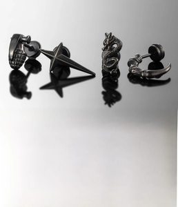 Set de boucles d'oreilles en acier noir avec détails dragon, étoile et grenade