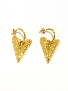 Macro shot of 18K gold plated heart earrings with unique hammered texture finish