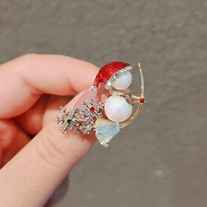 Christmas snowman brooch with pearls and festive crystals on gold-plated metal base