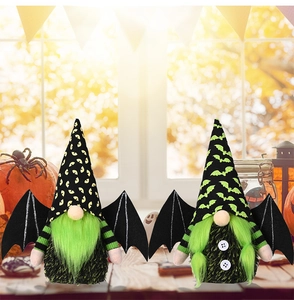 Detail of Halloween gnome plush dolls with green beard and black bat wings decoration