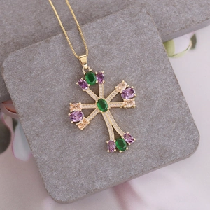 Gold 18K necklace with cross pendant featuring green and purple cubic zirconia stones