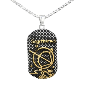Detailed view of silver and gold Sagittarius zodiac dog tag pendant with embossed details