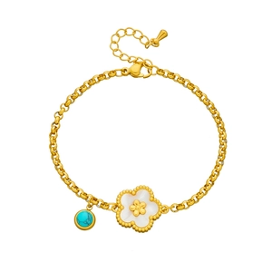 Elegant gold chain bracelet with white shell flower pendant and turquoise stone bead