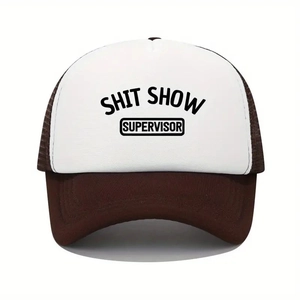 Close-up of Shit Show Supervisor print on white foam crown of two-tone trucker hat
