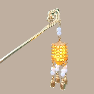 Elegant Chinese gold hair pin with pagoda pendant and golden bell tassels for women