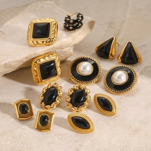 Vintage gold stainless steel earrings set with black enamel and pearls on stone