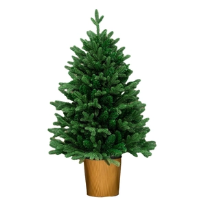 Miniature green Christmas tree with golden ribbed pot for festive desktop decoration
