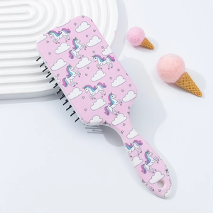Pink unicorn cartoon hairbrush with cushioned bristles and starry sky pattern