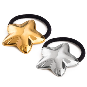 Minimalist star-shaped stainless steel hair ties in gold and silver set on white background