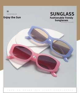 Detail view of pink and light purple square polarized sunglasses on white display stands