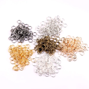 Macro view of multi-color jump rings for jewelry making in gold silver and rose gold