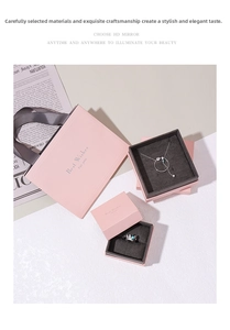 Pink jewelry gift set with necklace box and matching bag featuring elegant textures