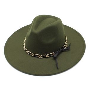 Detailed close-up of an olive green wool fedora with a 9.5cm wide brim and chain accent