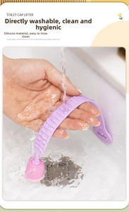 Waterproof silicone toilet lid lifter being washed under a faucet for hygiene