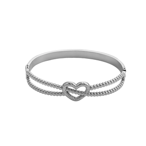 Macro detail of silver stainless steel bracelet featuring heart motif and double bead rows