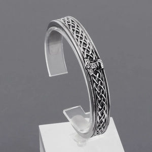 Polished silver stainless steel Mjölnir Viking bangle with embossed knotwork and runes
