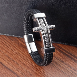 Men's retro braided leather bracelet with silver textured metal cross and magnetic clasp