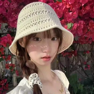 Chic cream hollow knit bucket hat for women with breathable crochet pattern for sun protection
