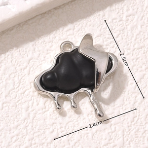 Macro shot of silver cloud and lightning pendant with measurements 2.5cm by 2.4cm
