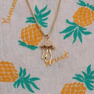 Fashionable gold-plated copper octopus pendant necklace with sparkling cubic zirconia inlay