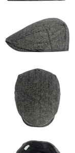 Détails de la casquette gavroche en laine à chevrons gris avec coutures et étiquette