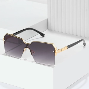 Fashionable oversized square sunglasses with gold metal frame and purple gradient lenses