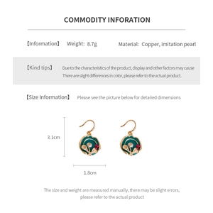 Detail view showing dimensions of vintage enamel flower earrings with pearl drop