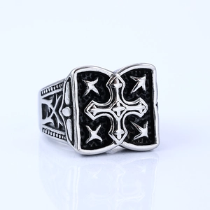 Vintage stainless steel cross ring for men with black textured finish and gothic engravings