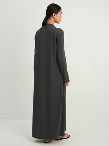 Detail of soft charcoal grey knitted long sleeve maxi dress with premium draped texture