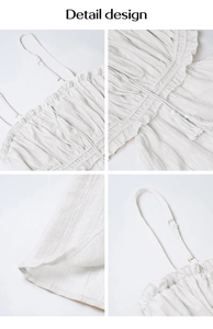 Detail design of white bohemian dress featuring adjustable straps and tassel drawstring