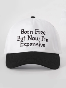 Detailed embroidery of Born Free But Now I'm Expensive on a black and white baseball cap
