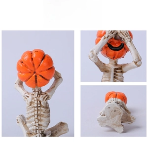 Show the details of Halloween pumpkin head skeleton figurine with aged resin texture
