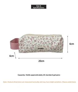 Floral fabric pencil case with pink handle showing 20x6x6cm size and 20-pen capacity