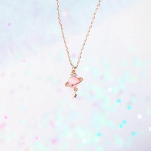 Rose gold Saturn planet pendant necklace with pink stone and star charm on fine chain