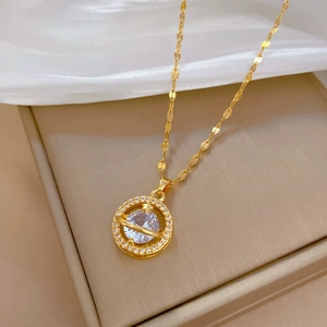 Elegant gold titanium steel planet pendant necklace with shimmering zircon accents