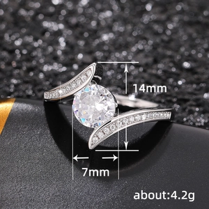 Exquisite silver ring with large round solitaire and pave diamond band design