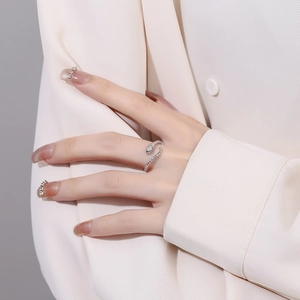 925 sterling silver snake-shaped open ring with sparkling cubic zirconia on model hand