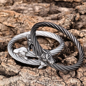 Macro shot of Viking wolf head twisted rope bracelets in silver and antique finish