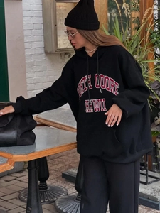 Oversized black hoodie with red and white North Coore Hawaii print for outdoor style