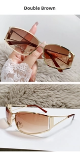 Detail of Y2K tech sunglasses with gold hollow metal frame and double brown gradient lenses