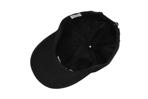 Detail view of cotton baseball cap interior featuring clean stitching and wash label