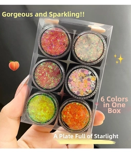 Close-up of a 6-color glitter gel palette for eye and body makeup with star patterns